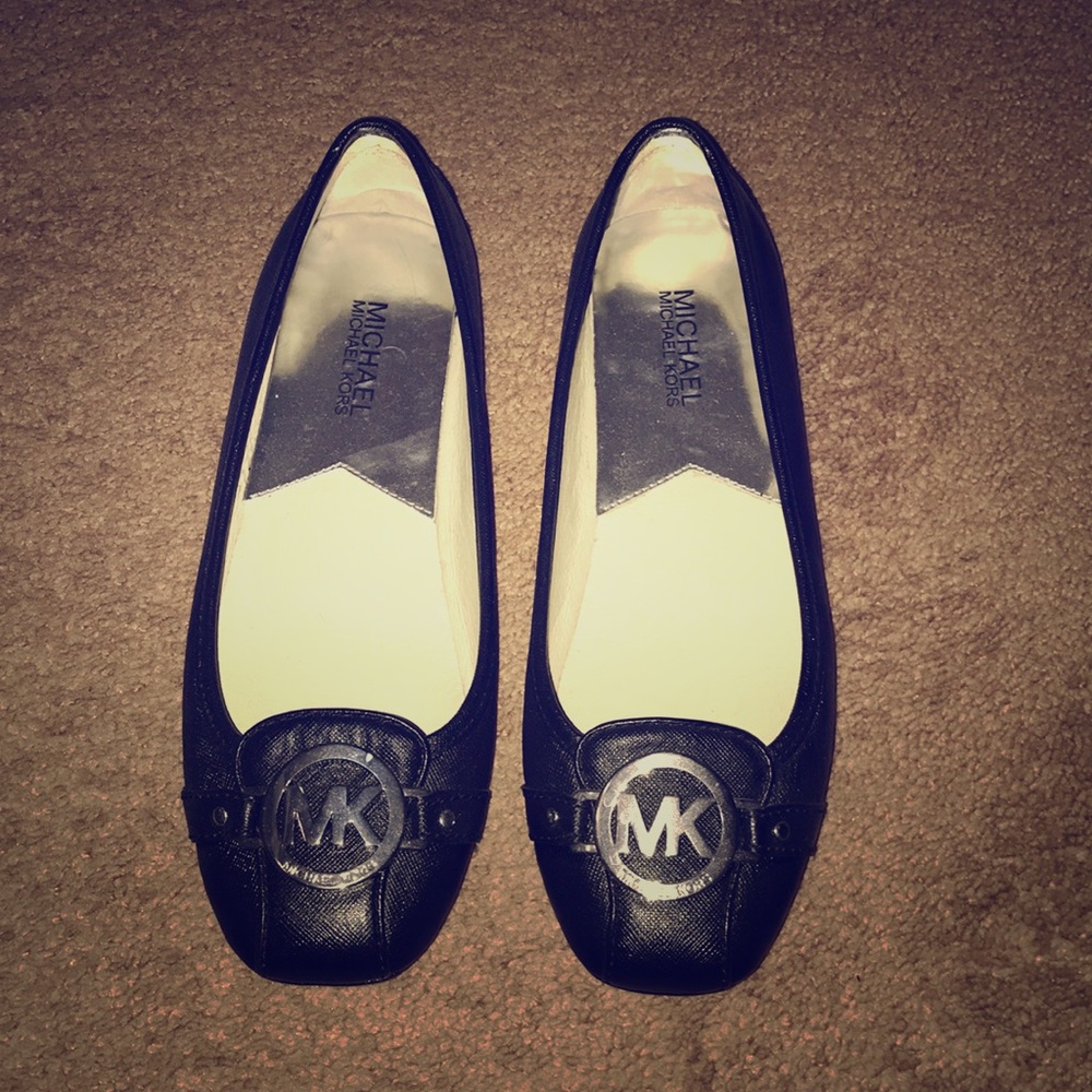 Michael Kors flats.